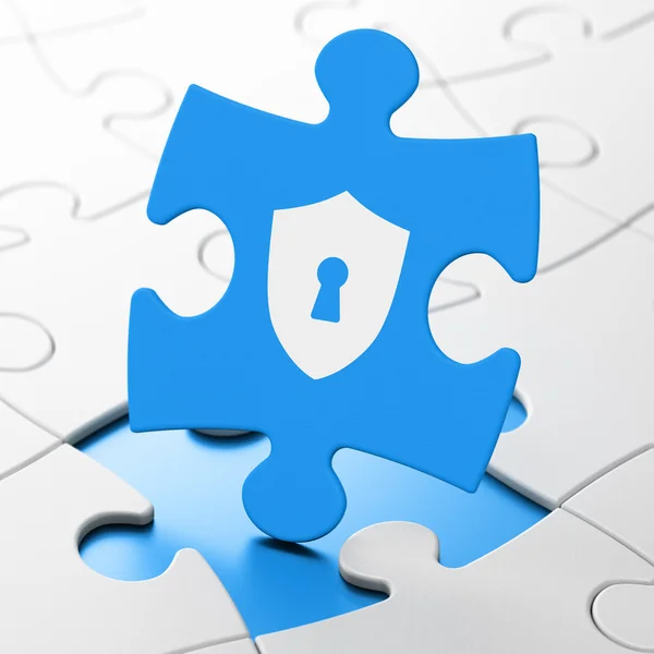 Privacy concept: Shield With Keyhole on puzzle background — Stock Photo, Image
