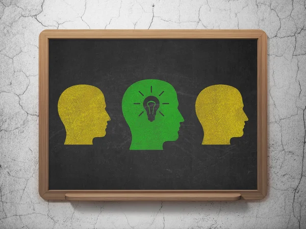 Business concept: head with light bulb icon on School Board background — ストック写真