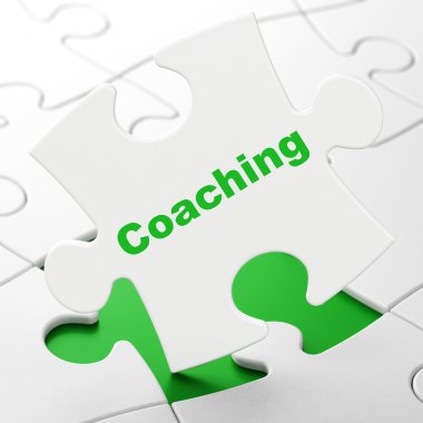 Learning concept: Coaching on puzzle background
