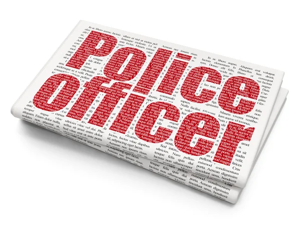 Закон концепція: офіцер поліції на фоні газета — стокове фото