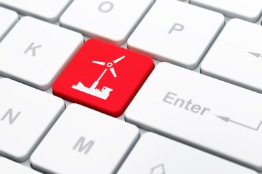 Manufacuring kavramı: bilgisayar klavye arka plan üzerinde yel değirmeni