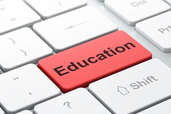 Концепция обучения: образование на фоне компьютерной клавиатуры — стоковое фото