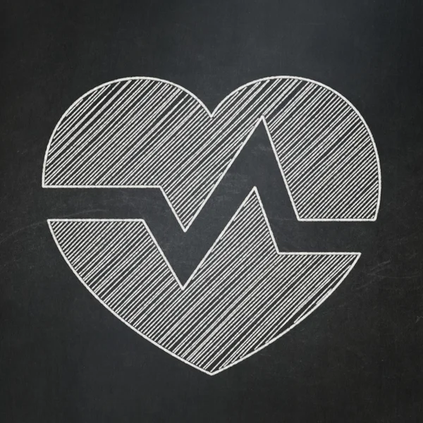 Health concept: Heart on chalkboard background — Stock fotografie