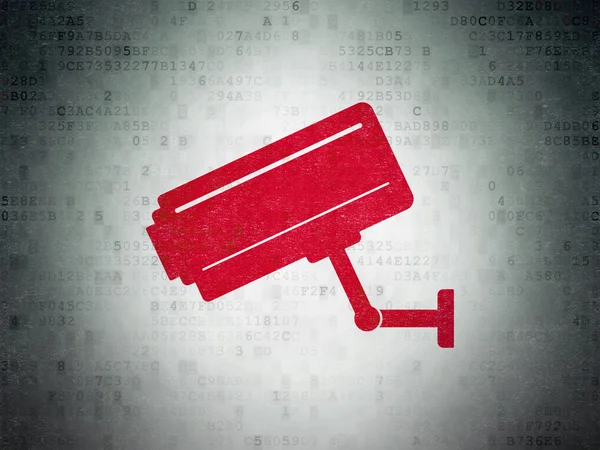 Sicherheitskonzept: Videokamera auf digitalem Papierhintergrund — Stockfoto
