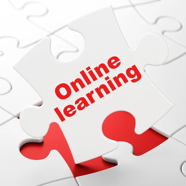 Education concept: Online Learning on puzzle background — Zdjęcie stockowe