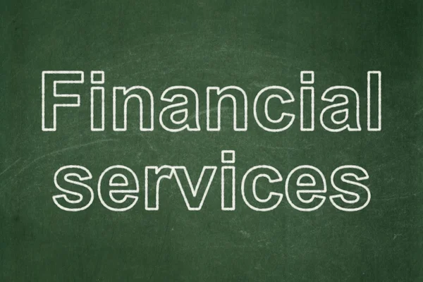 Money concept: Financial Services on chalkboard background — 图库照片
