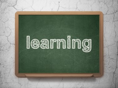 Learning concept: Learning on chalkboard background