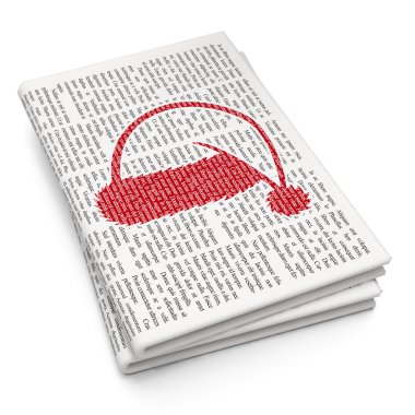 Holiday concept: Christmas Hat on Newspaper background