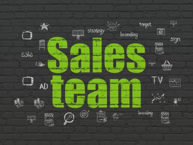 pazarlama kavramı: duvar arka plan üzerinde satış ekibi