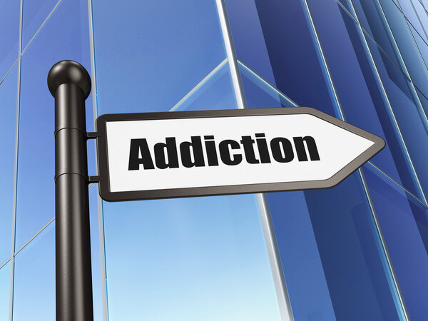 Medicine concept: sign Addiction on Building background