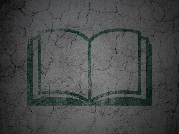 Education concept: Book on grunge wall background — Stok fotoğraf