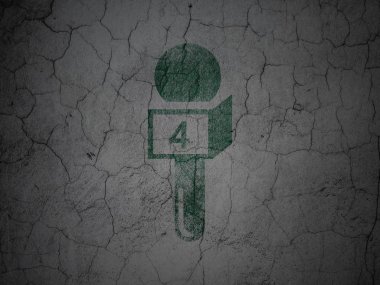 News concept: Microphone on grunge wall background