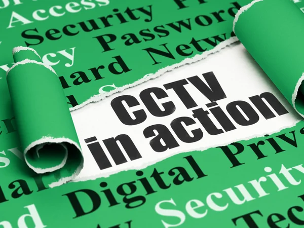 Privacy concept: black text CCTV In action under the piece of  torn paper — Stock Photo, Image