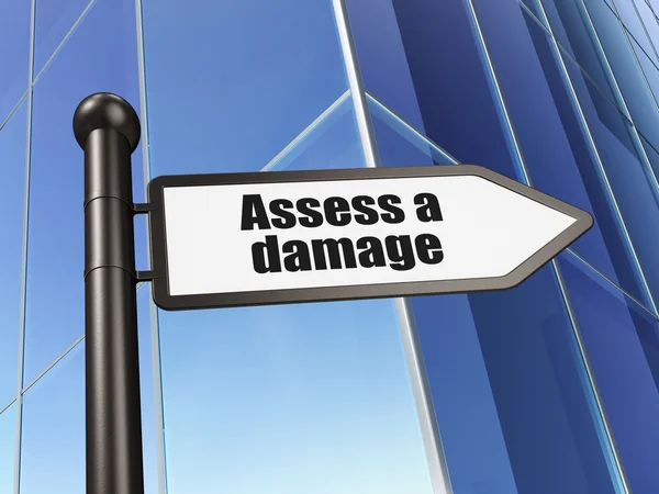 Insurance concept: sign Assess A Damage on Building background — Stock fotografie