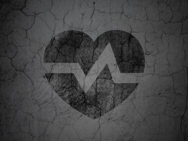 Health concept: Heart on grunge wall background