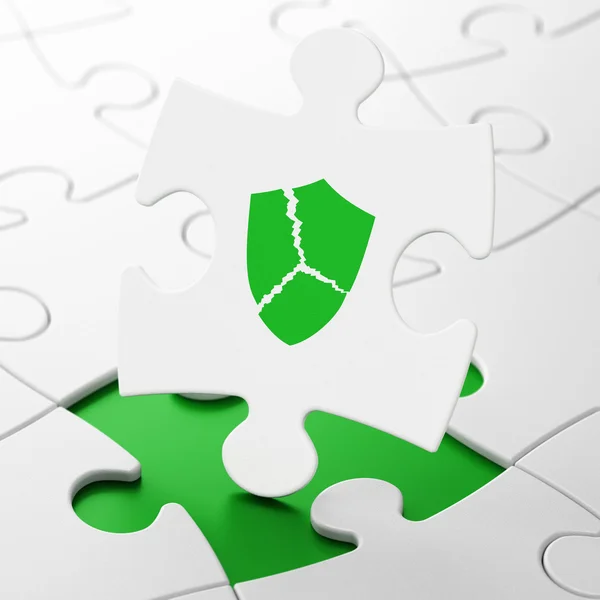 Security concept: Broken Shield on puzzle background — Stockfoto