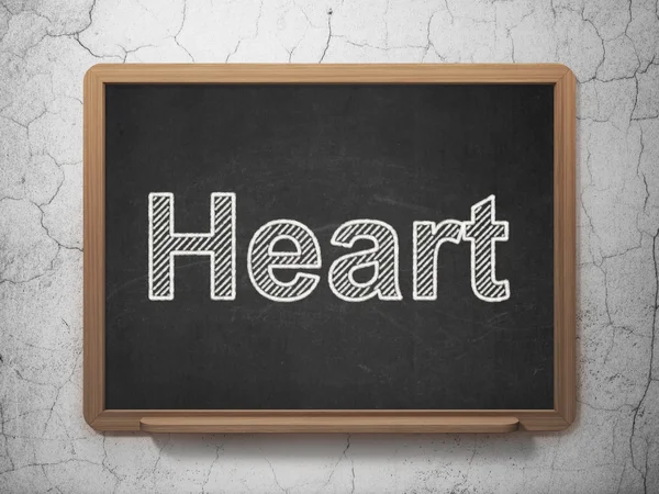 Sağlık kavramı: Kara tahta arka plan üzerinde kalp — Stok fotoğraf
