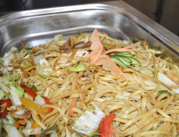 Vegetable chow mein meal at a buffet