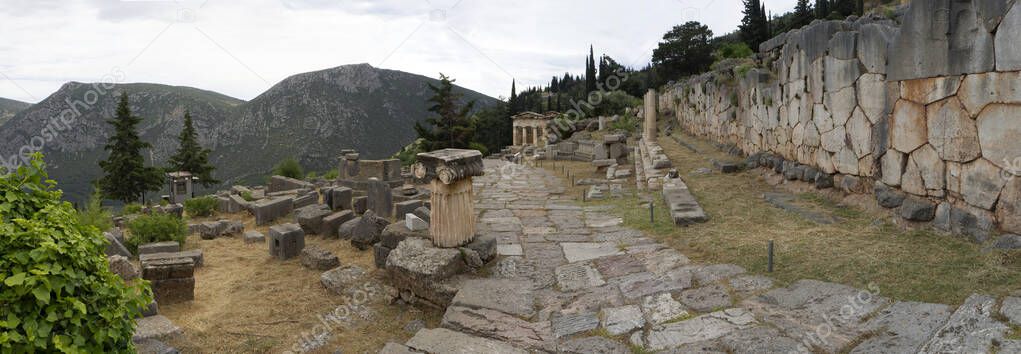 Panoramic view of the Syracuse Treasury Site the with columns and stoa of Athenians in Delphi in Greece 