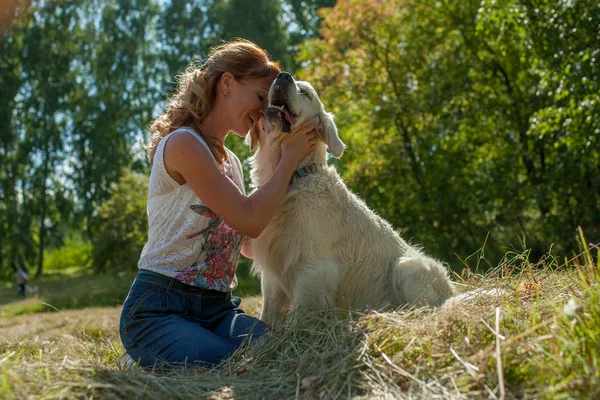 Woman and dog together