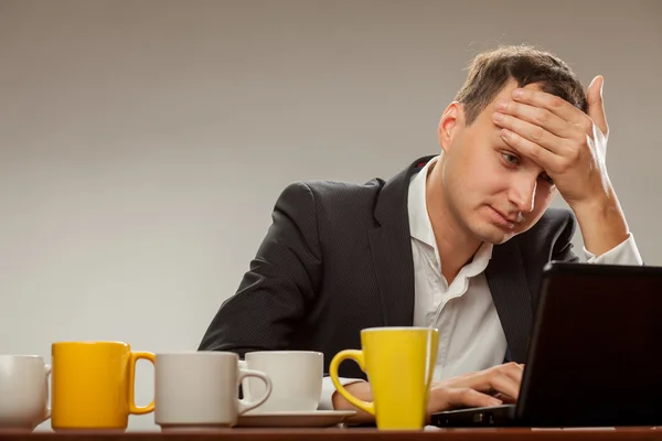 Young man at the computer — Stock Photo, Image