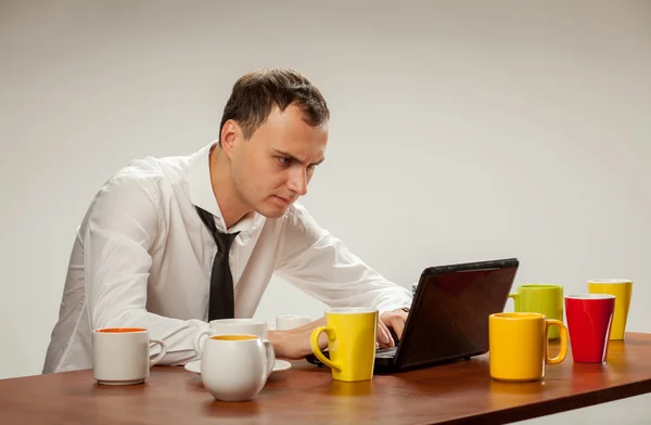 Young man at the computer — Stock Photo, Image