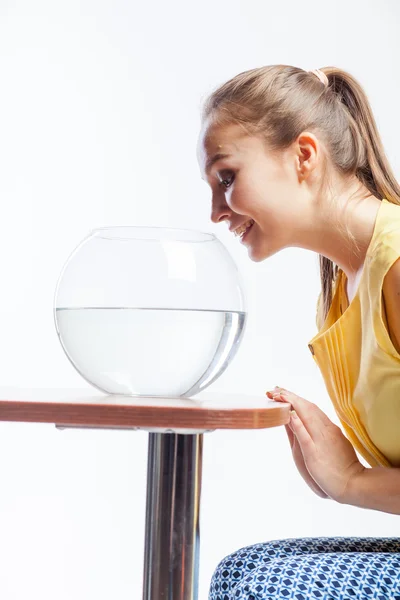 Girl with an aquarium — Stock Photo, Image