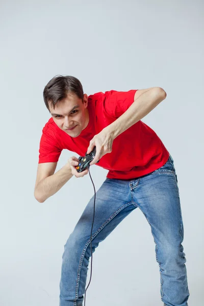 Junger Kerl mit einem Steuerknüppel — Stockfoto