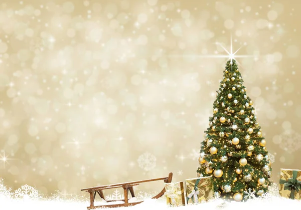 黄金のクリスマスツリーボールそり 抽象的な背景雪 — ストック写真