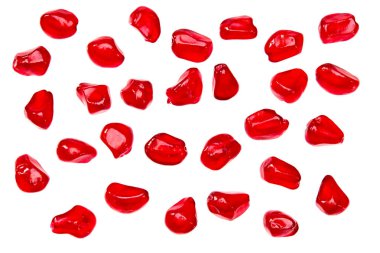 Beyaz arka planda izole edilmiş nar tohumları. Nar çileği. en üstteki görünüm