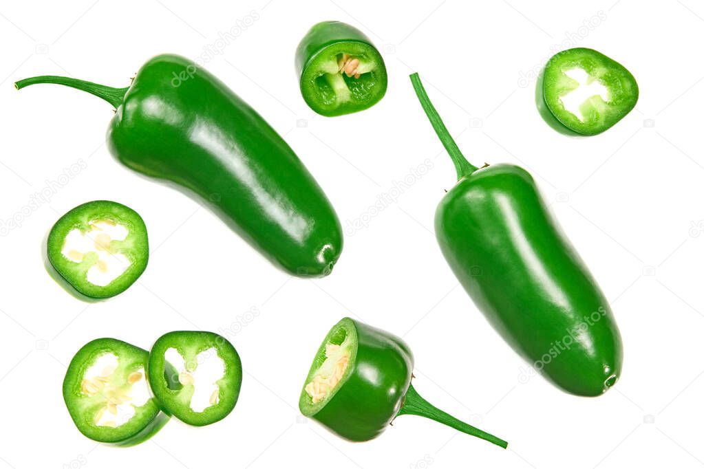 sliced jalapeno peppers isolated on white background. Green chili pepper. Capsicum annuum. top view