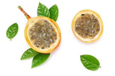 sliced granadilla or yellow passion fruit isolated on white background. exotic fruit. clipping path. top view