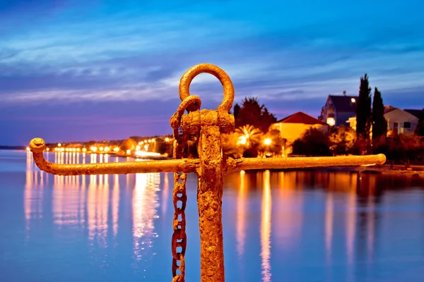 Rusty anchor view at blue evening — Stock Photo, Image