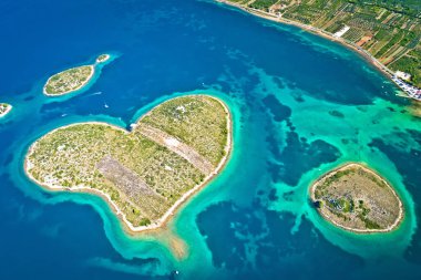 Heart shaped island of Galesnjak in Zadar archipelago aerial view, Dalmatia region of Croatia clipart