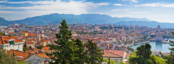 Split panoramic waterfront view of architecture and nature