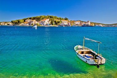 Turquoise beach and boat in Rogoznica