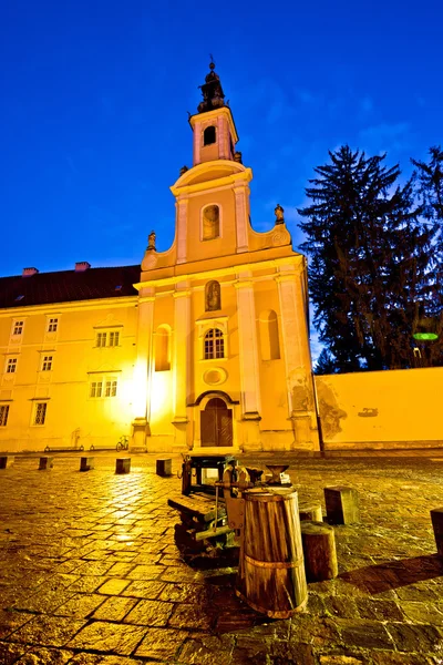 Varazdin old street and church evening view — Stock Photo, Image