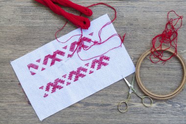 Ukrainian national red embroidery thread, selective focus