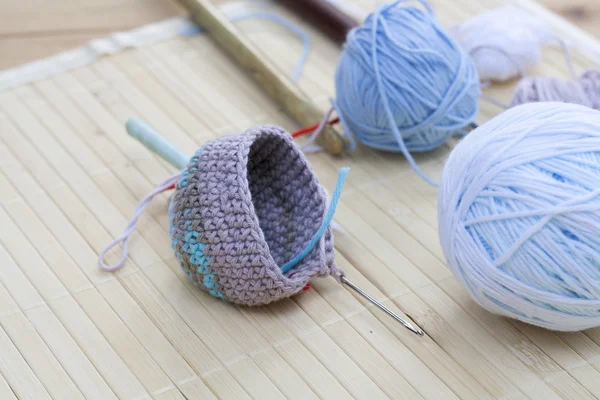 Color woolen clews for knitting and crochet woven piece close-up, selective focus — Stockfoto