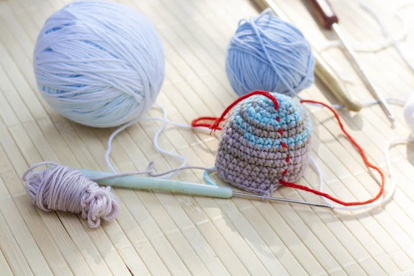 Color woolen clews for knitting and crochet woven piece close-up, selective focus — Stock fotografie