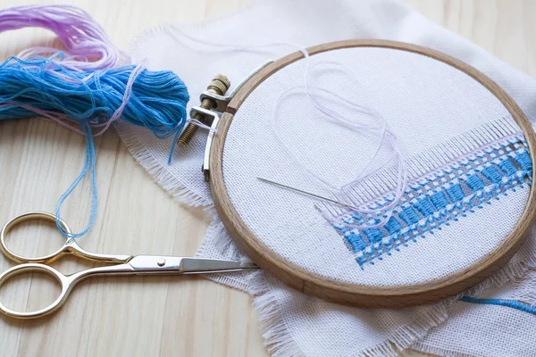 Openwork embroidery, incomplete work in progress and tools for embroidery — Stock Photo, Image