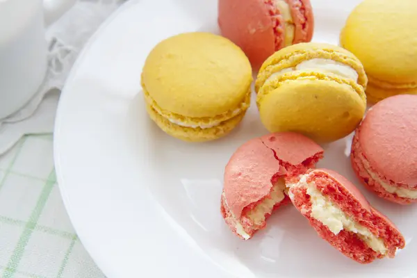 Colorful french macaroons in white dish with soft vintage color — Stock Photo, Image