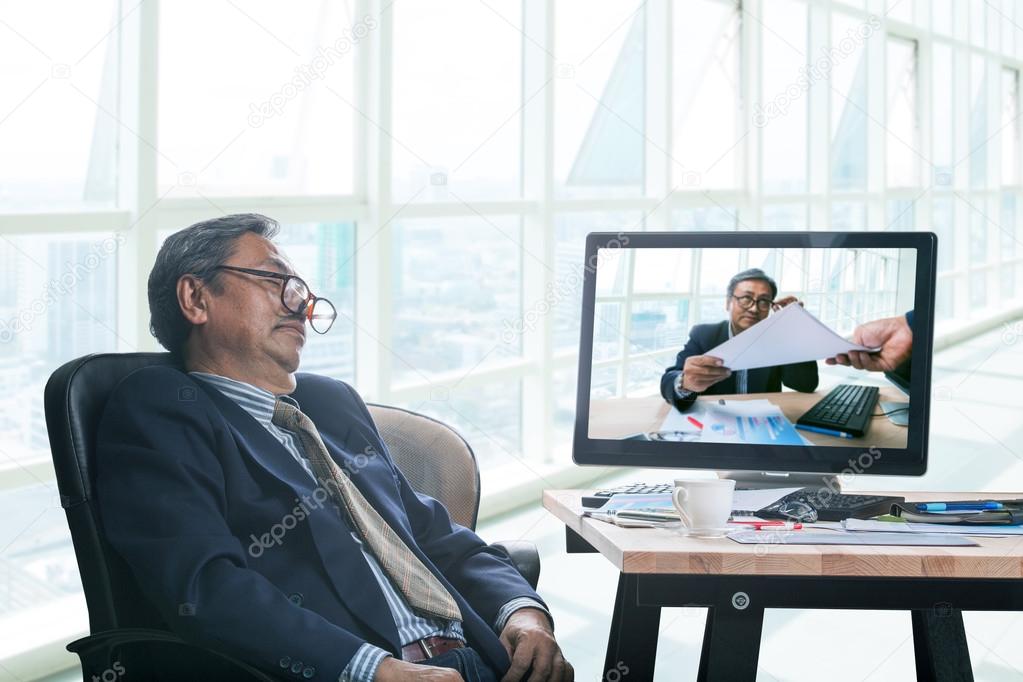 senior business man asleeping in office working time  with himse