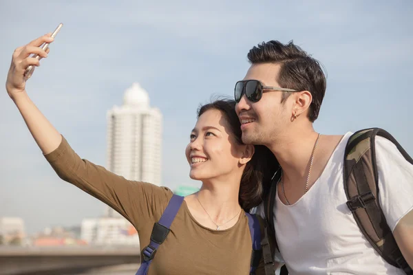 Portrait of young man and woman selfie ,self portrait by mobile — Stock Photo, Image