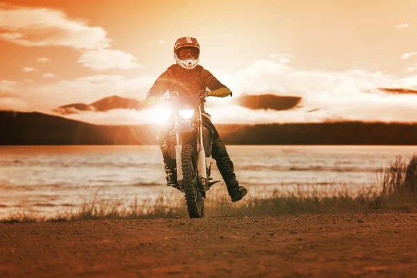 Man riding enduro motorcycle in motor cross track use for people — Stock Photo, Image