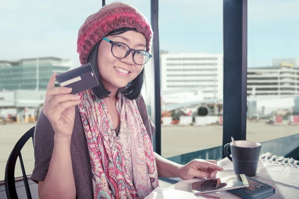 asian woman happiness smiling face with credit card in hand use