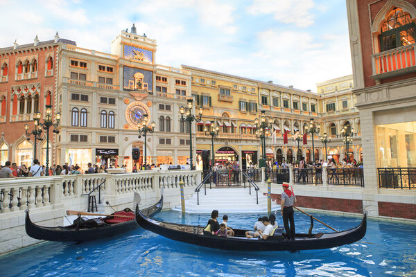 COTAI STRIP, MACAU, CHINA-AUGUST 22 visitor on gondola boat in V