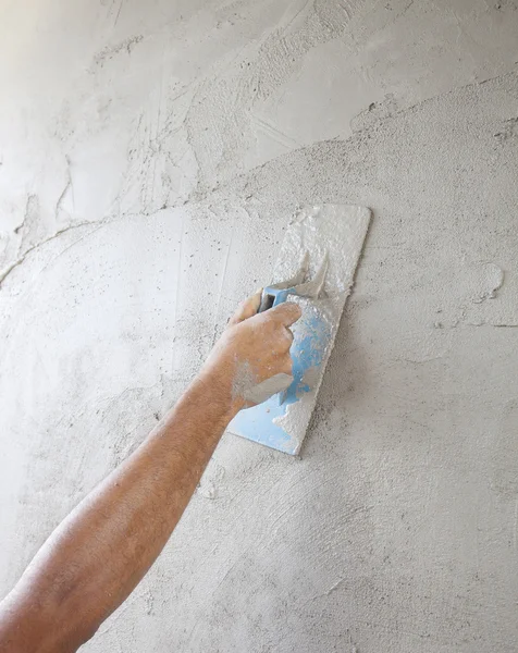 Worker hand working to built cement wall of home construction — Stock Photo, Image