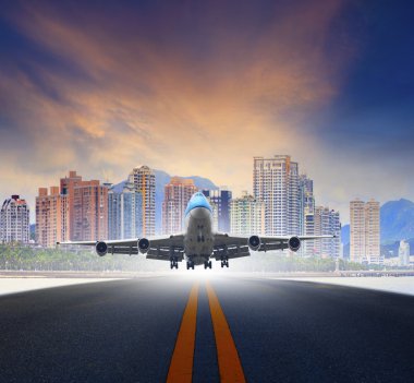 Jet plane take off from urban airport runways use for air transp clipart