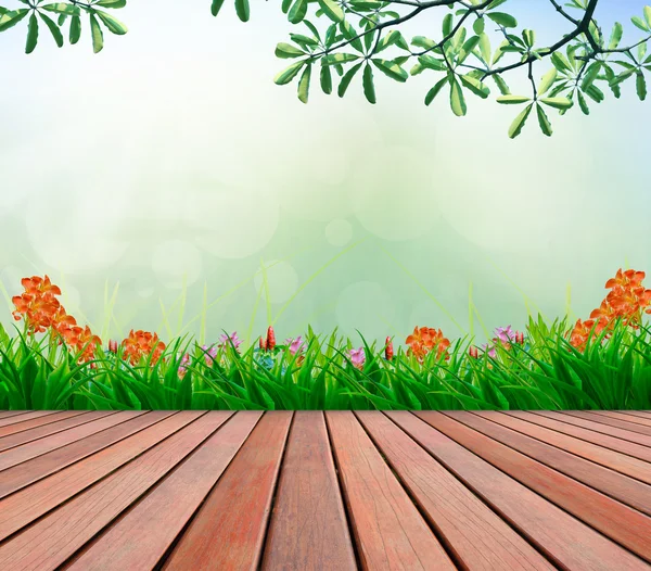 Terraza de madera y jardín de flores con espacio de copia borrosa para múltiples — Foto de Stock